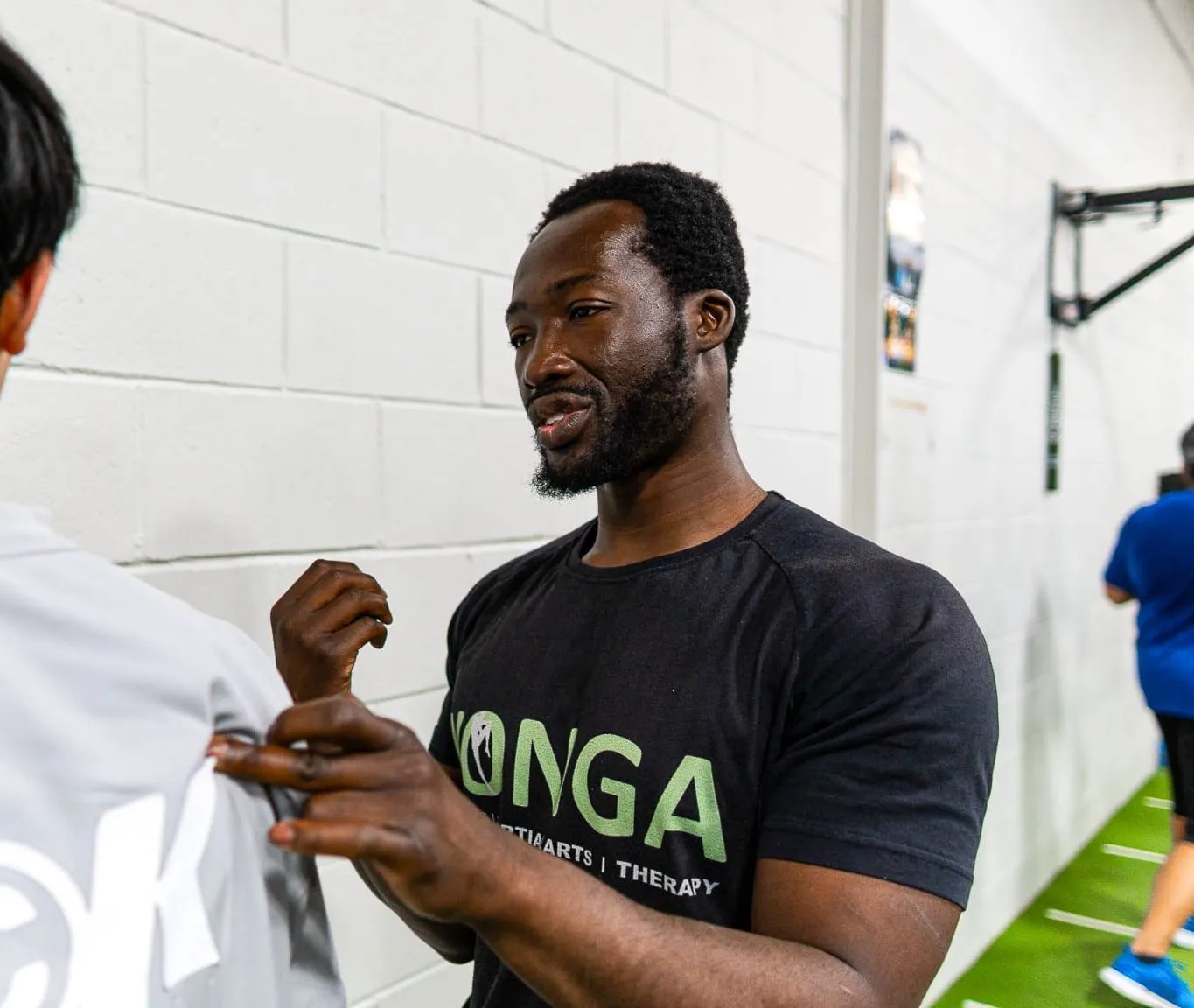 Personal trainer demonstrating hand positioning