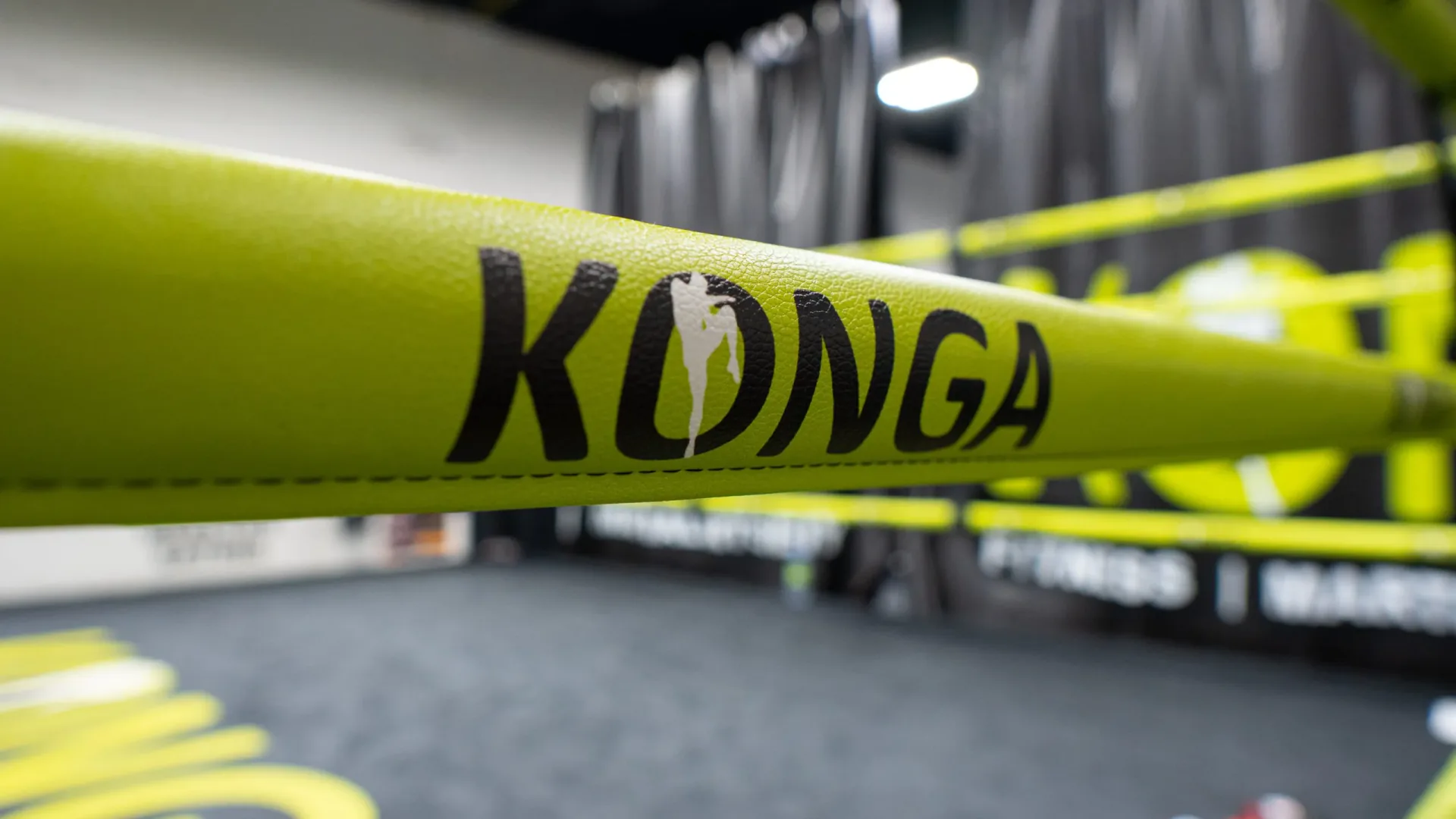 Close-up of a yellow boxing-ring rope bearing the Konga name