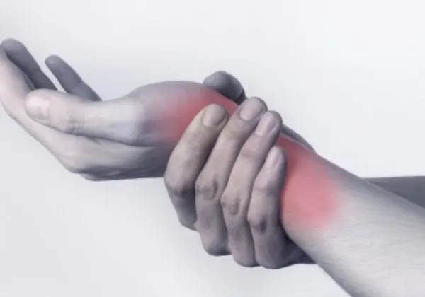Person holding a wrist highlighted in red