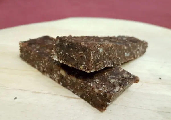 Stack of homemade chocolate chia and date bars