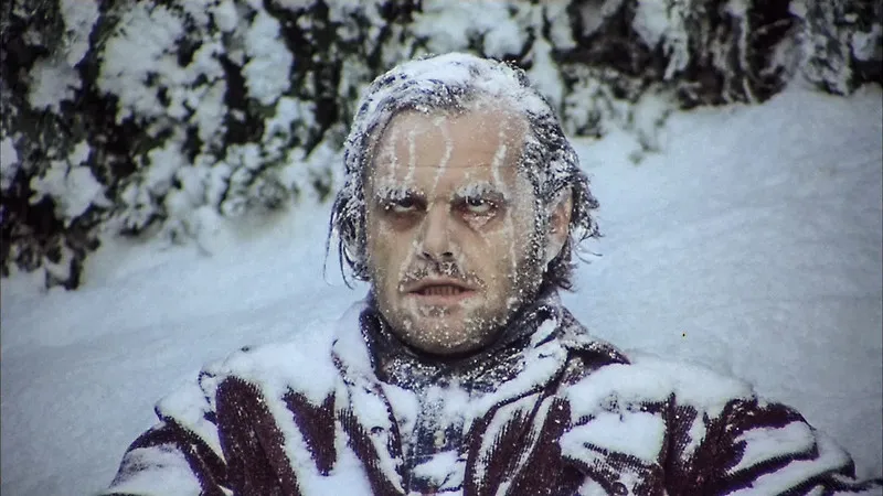 Person covered in snow and frost